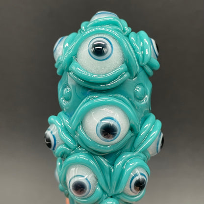 The Never-Blinking One glass effigy pendant