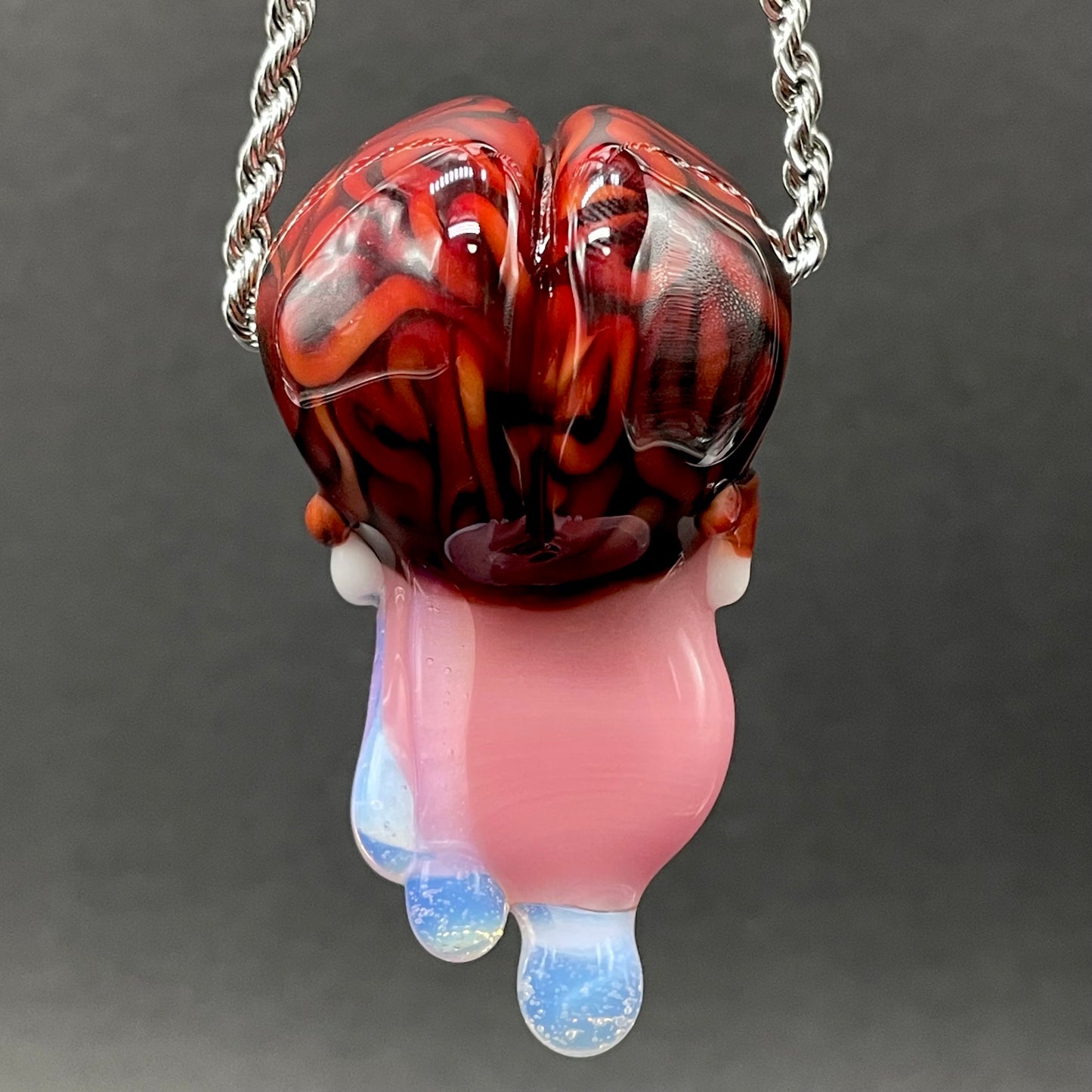 Mastermind glass pendant