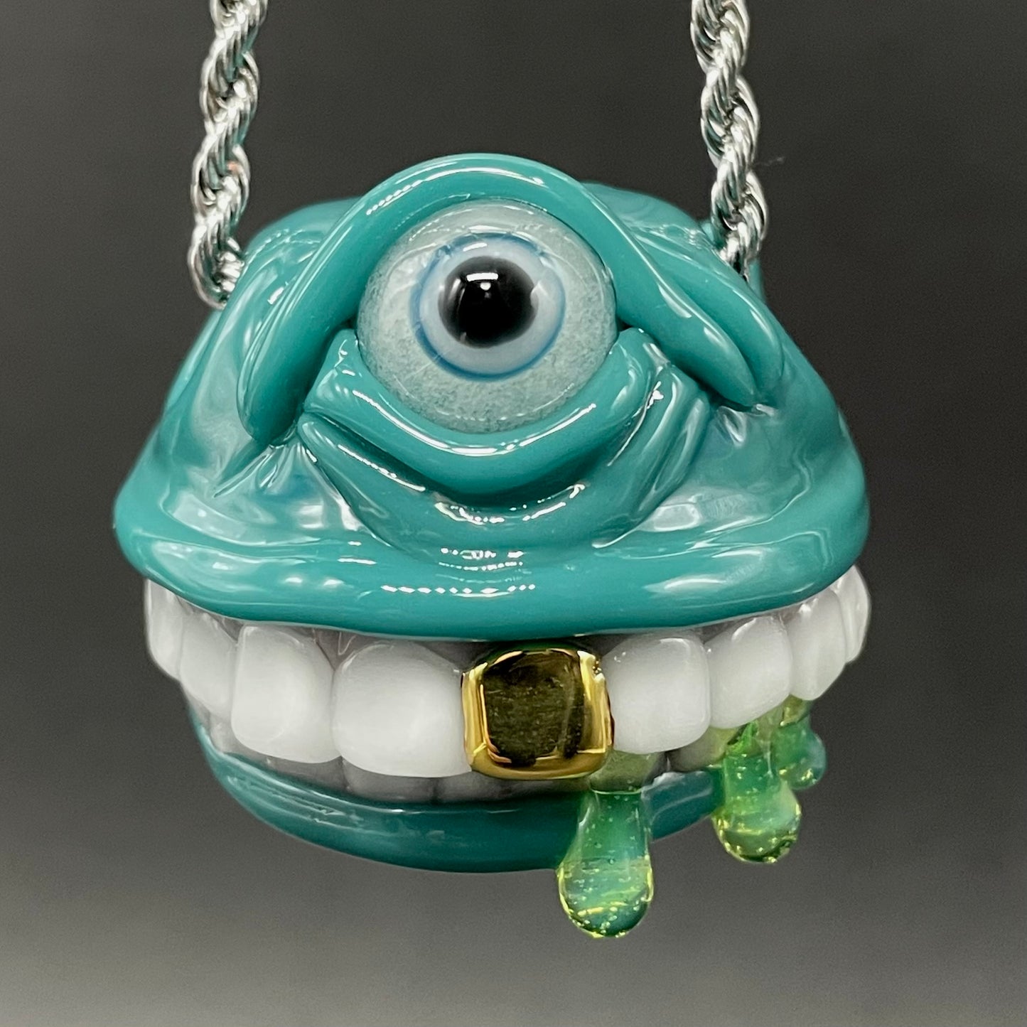 Grinning like a fool glass pendant