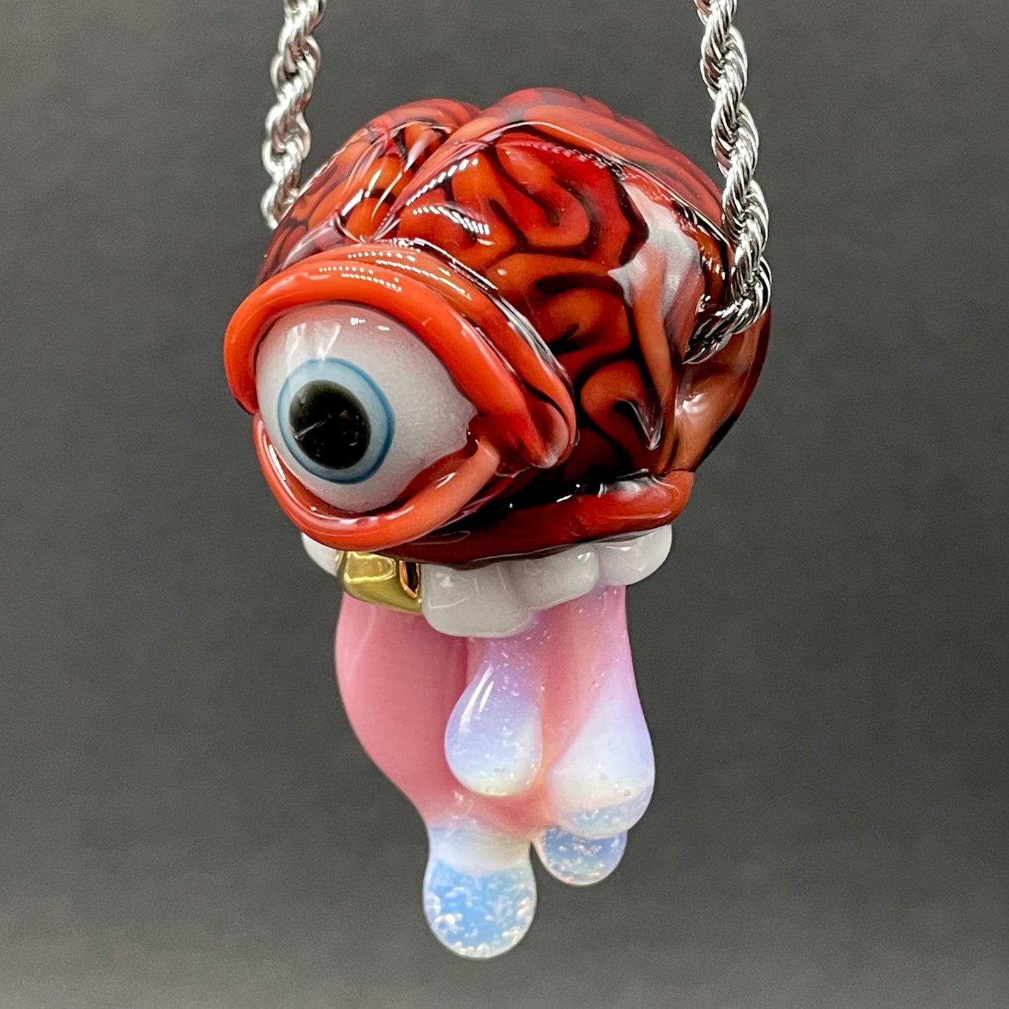 Mastermind glass pendant