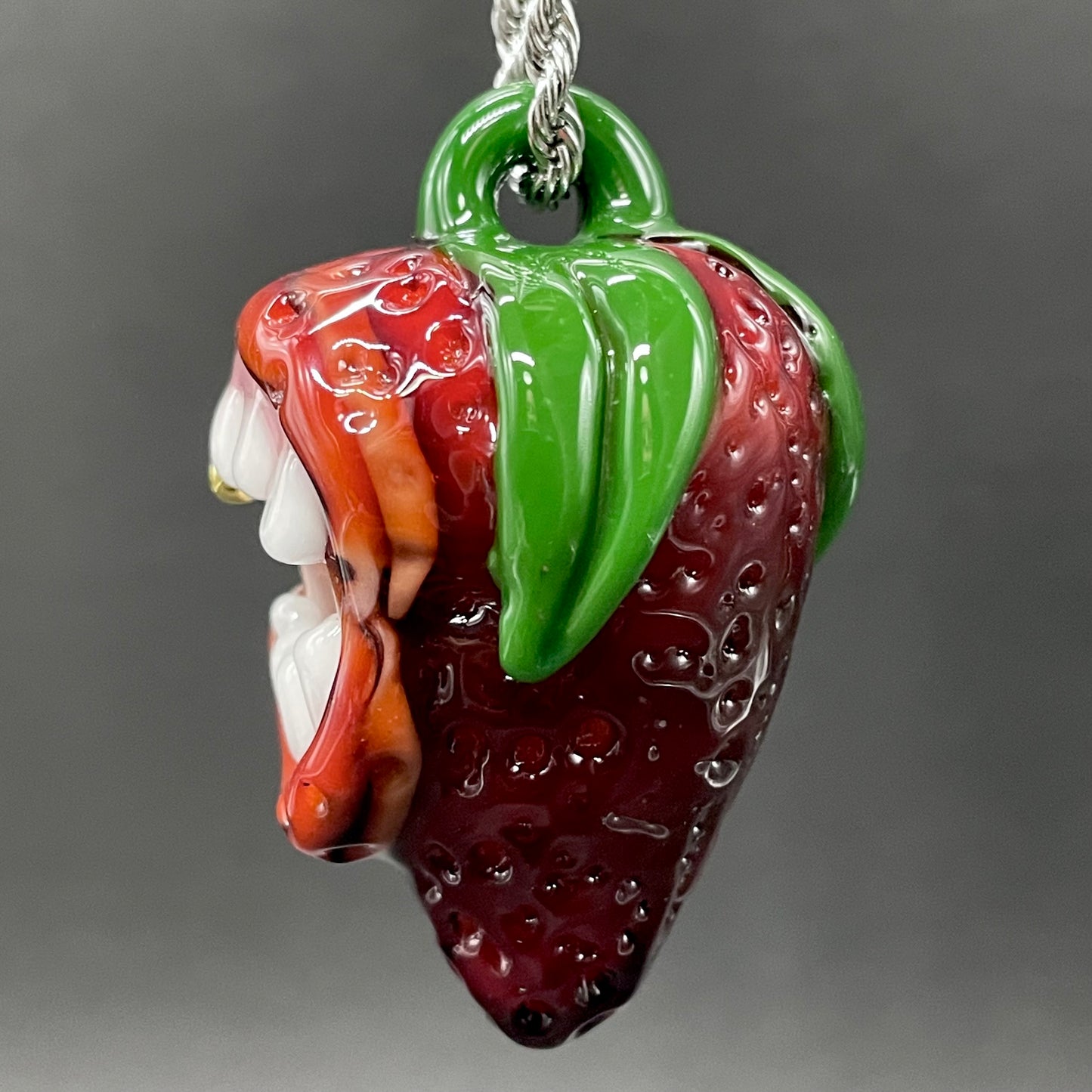 Screaming strawberry glass pendant