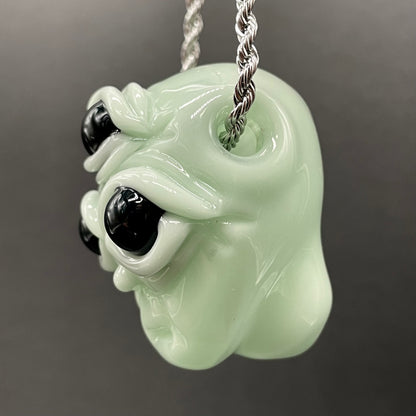 Time manipulating three eye glass alien pendant