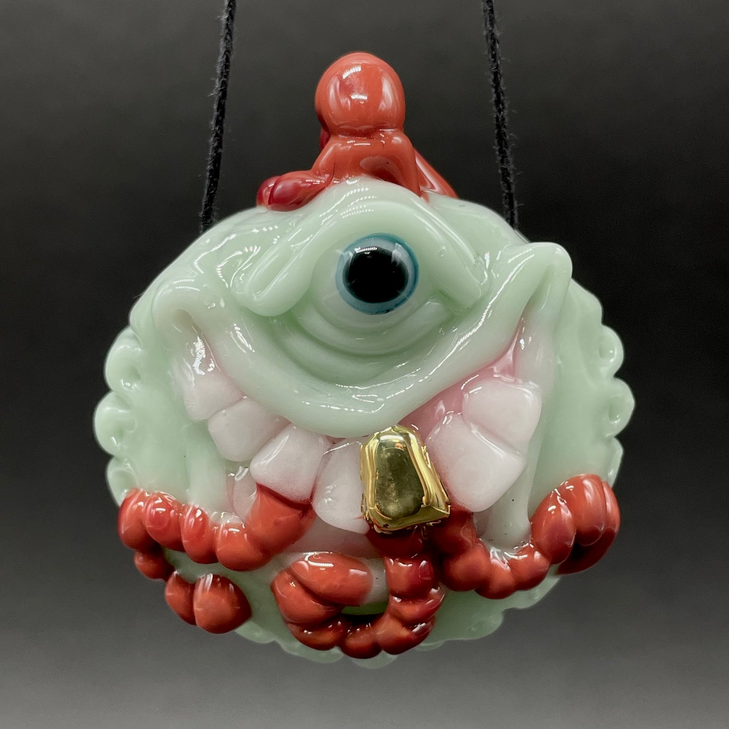 Worm eater pendant