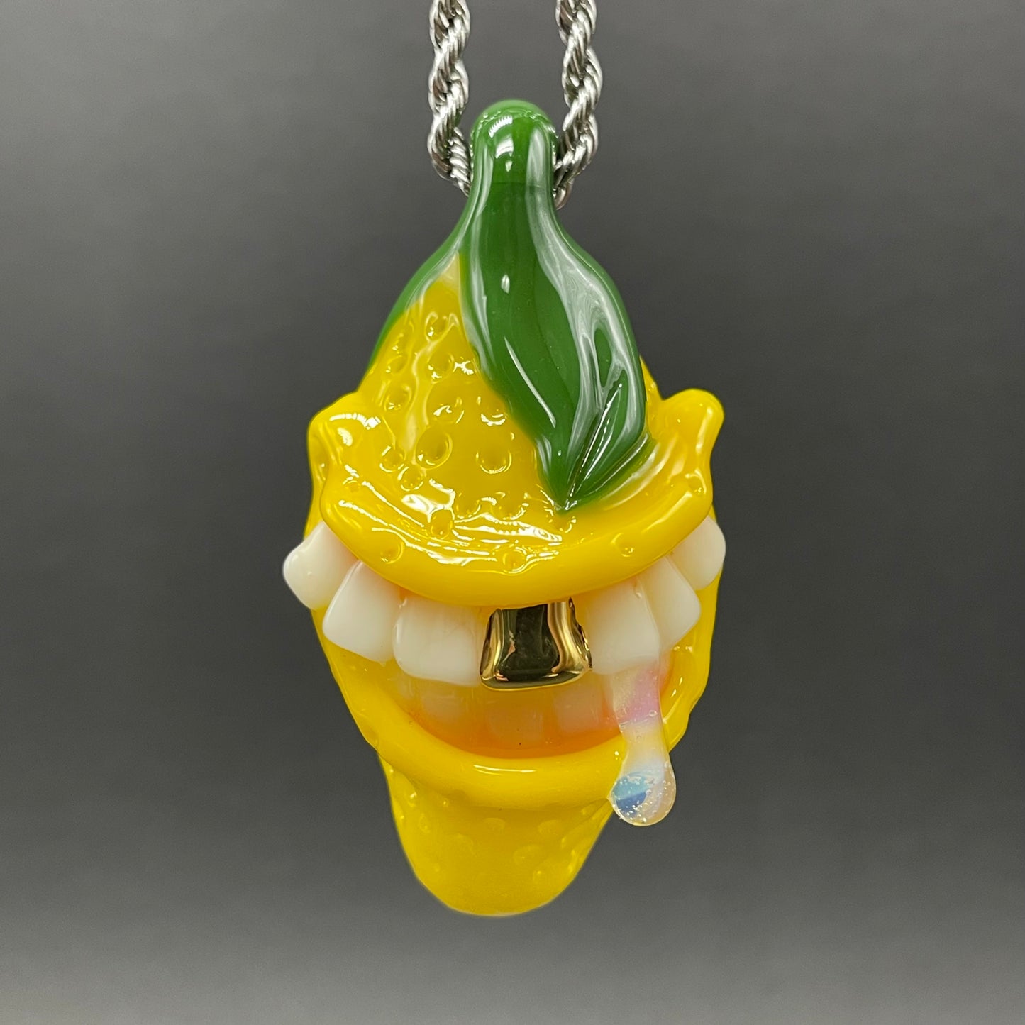 Grinning lemon pendant