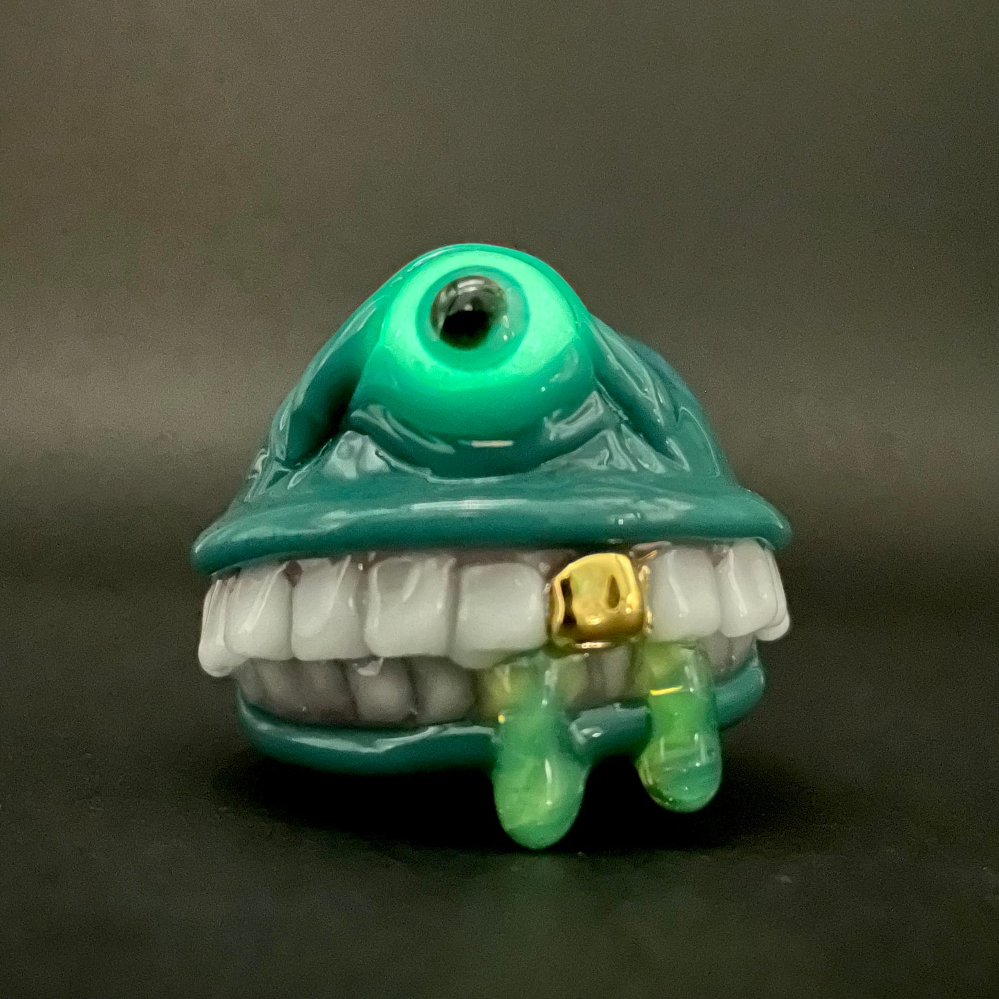 Grinning like a fool glass pendant