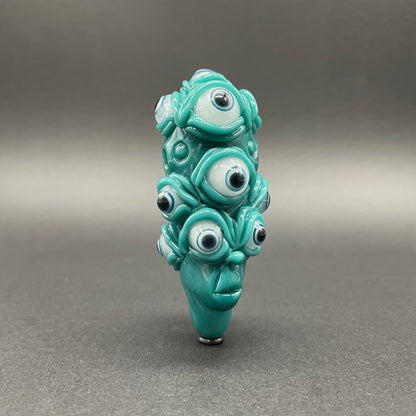 The Never-Blinking One glass effigy pendant