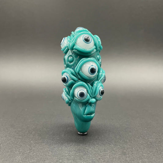 The Never-Blinking One glass effigy pendant