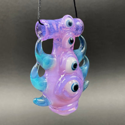 Pink slime evil eye pendant